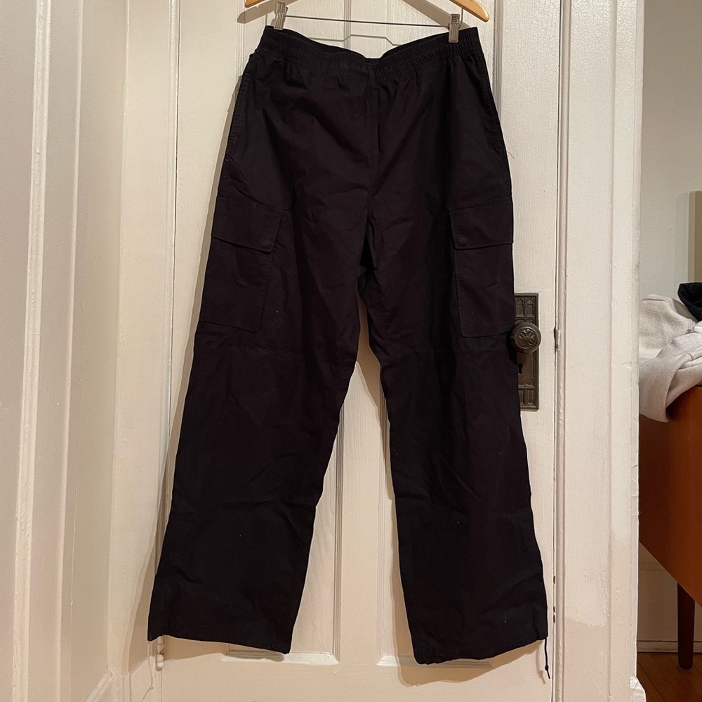 Our Legacy black cargo parachute pants *flawed*